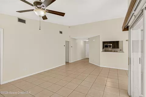 Living - 718 Pine Island Dr, Melbourne, FL 32940 photo 2 of 7