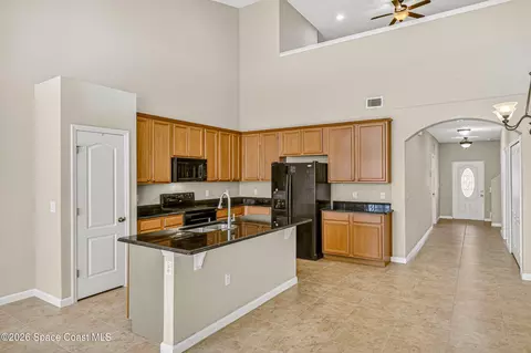 Kitchen - 133 Montecito Dr, Satellite Beach, FL 32937 photo 3 of 4