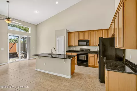 Kitchen - 133 Montecito Dr, Satellite Beach, FL 32937 photo 2 of 4