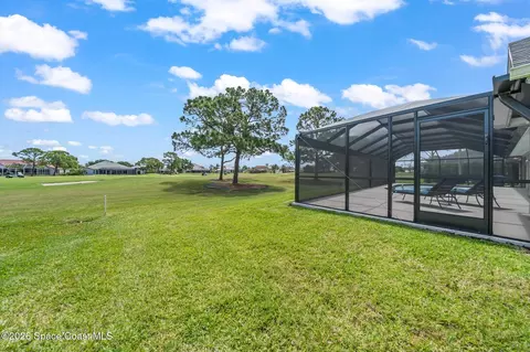 Exterior - 697 Spring Lake Dr, Melbourne, FL 32940 photo 6 of 8