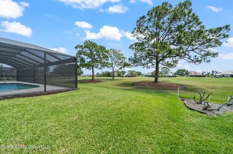 Exterior - 697 Spring Lake Dr, Melbourne, FL 32940 photo 7 of 8