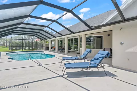 Exterior - 697 Spring Lake Dr, Melbourne, FL 32940 photo 5 of 8