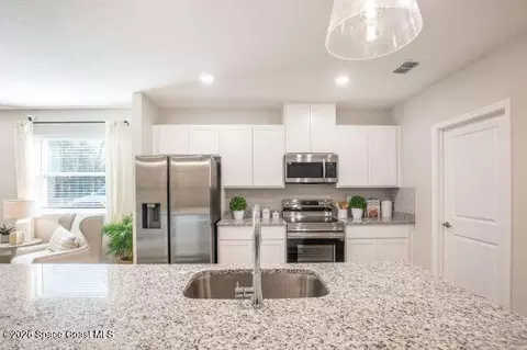 Kitchen - 1407 Needle Palm Dr, Edgewater, FL 32132 photo 2 of 3