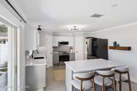 Kitchen - 4981 Spinet Dr, Melbourne, FL 32940 photo 1 of 4