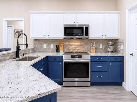 Kitchen - 1697 Atrium Dr, Melbourne, FL 32935 photo 2 of 4