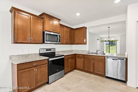 Kitchen - 3628 Loggerhead Ln, Mims, FL 32754 photo 2 of 5