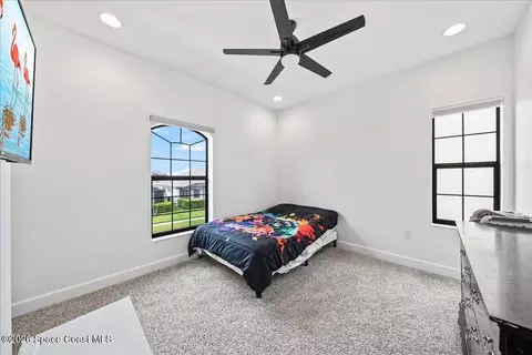 Bedroom - 8476 Lyside Dr, Melbourne, FL 32940 photo 4 of 5