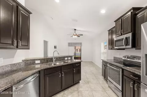 Kitchen - 869 Fiddleleaf Cir, Melbourne, FL 32904 photo 2 of 3