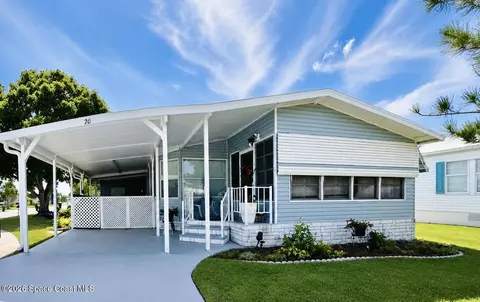 701 Gladiolus Dr, Barefoot Bay, FL 32976