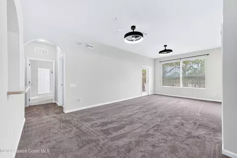 Living - 3848 Lexmark Ln #210, Rockledge, FL 32955 photo 1 of 4