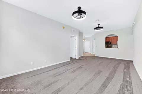Living - 3848 Lexmark Ln #210, Rockledge, FL 32955 photo 3 of 4