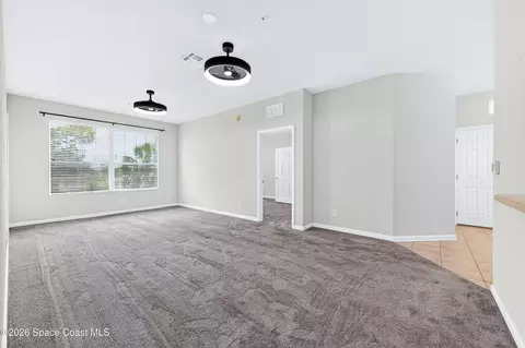 Living - 3848 Lexmark Ln #210, Rockledge, FL 32955 photo 4 of 4