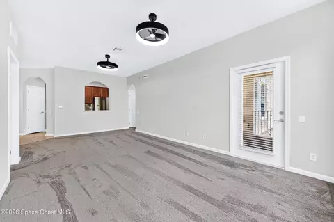 Living - 3848 Lexmark Ln #210, Rockledge, FL 32955 photo 2 of 4