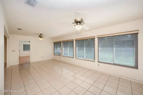 Living - 1527 Frontier Dr, Melbourne, FL 32940 photo 7 of 11