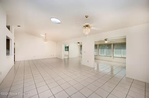 Living - 1527 Frontier Dr, Melbourne, FL 32940 photo 4 of 11