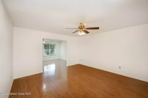 Living - 1527 Frontier Dr, Melbourne, FL 32940 photo 9 of 11