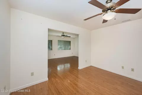 Living - 1527 Frontier Dr, Melbourne, FL 32940 photo 10 of 11