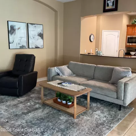 Living - 3933 Postridge Trl, Melbourne, FL 32934 photo 2 of 6