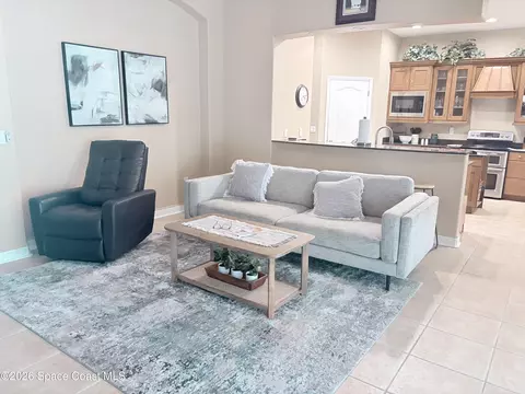 Living - 3933 Postridge Trl, Melbourne, FL 32934 photo 2 of 4