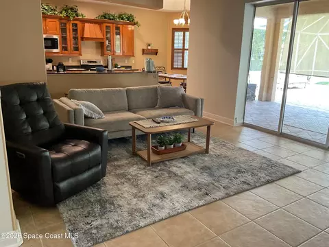 Living - 3933 Postridge Trl, Melbourne, FL 32934 photo 1 of 6