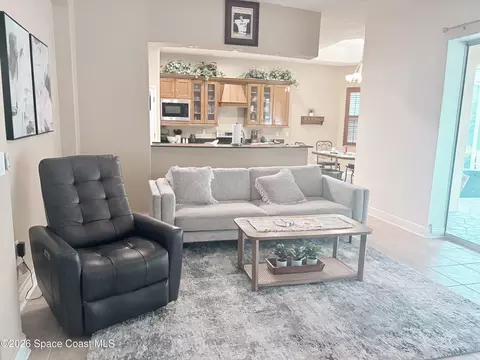 Living - 3933 Postridge Trl, Melbourne, FL 32934 photo 3 of 4