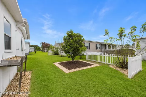 948 Cashew Cir, Barefoot Bay, FL 32976 photo 9