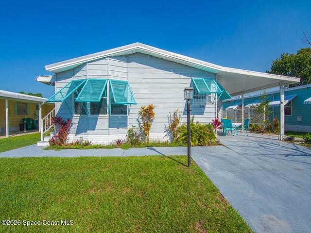 836 Hyacinth Cir, Barefoot Bay, FL 32976