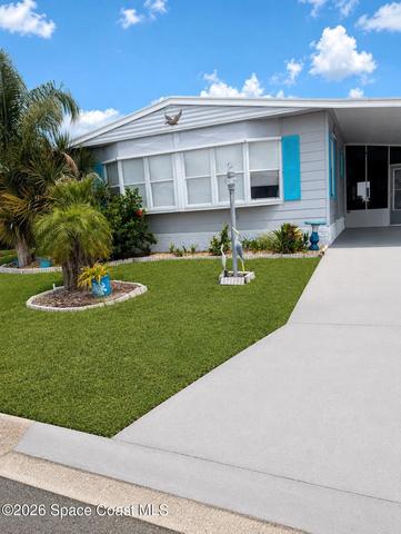 520 Seagull Dr E, Barefoot Bay, FL 32976