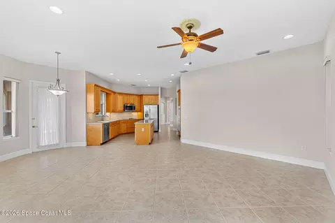 Living - 4696 Merlot Dr, Rockledge, FL 32955 photo 7 of 9