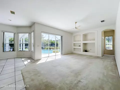 Living - 269 Carmel Dr, Melbourne, FL 32940 photo 9 of 12