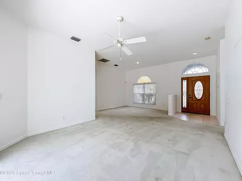 Living - 269 Carmel Dr, Melbourne, FL 32940 photo 3 of 12