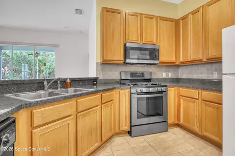 Kitchen - 4892 Outlook Dr, Melbourne, FL 32940 photo 1 of 3