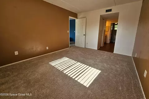 Bedroom - 3001 Thrush Dr #224, Melbourne, FL 32935 photo 2 of 2