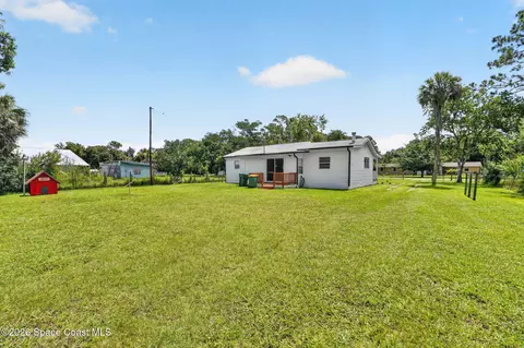 Exterior - 1944 Harlock Rd, Melbourne, FL 32934 photo 9 of 11