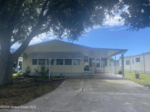 1202 Calusa Dr, Barefoot Bay, FL 32976