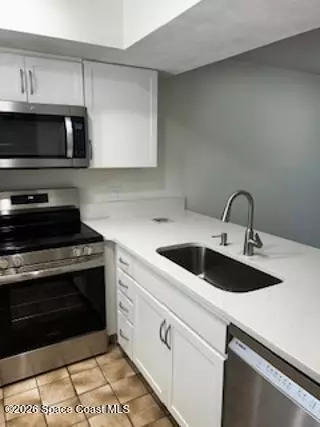 Kitchen - 1720 Murrell Rd #207, Rockledge, FL 32955 photo 2 of 4
