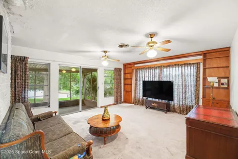 Living - 1150 Rivermont Dr, Melbourne, FL 32935 photo 1 of 2