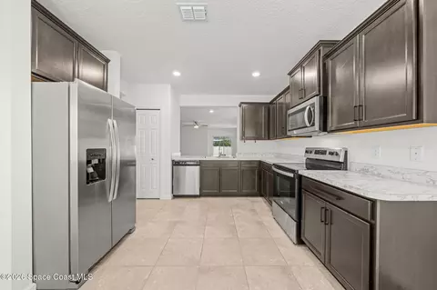 Kitchen - 6811 Snapping Turtle Trl, Cocoa, FL 32927 photo 2 of 3