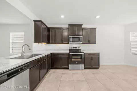 Kitchen - 6811 Snapping Turtle Trl, Cocoa, FL 32927 photo 3 of 3