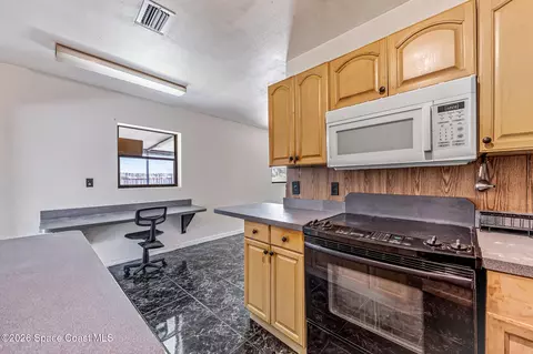 Kitchen - 2244 Post Rd, Melbourne, FL 32935 photo 1 of 2