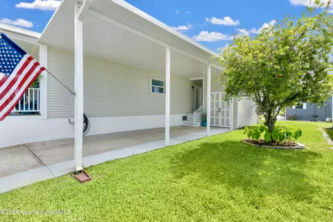 Exterior - 7604 Boxelder Rd, Micco, FL 32976 photo 7 of 13