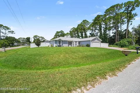 Exterior - 7260 Pluto Ave, Cocoa, FL 32927 photo 4 of 12