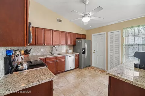 Kitchen - 7260 Pluto Ave, Cocoa, FL 32927 photo 1 of 2