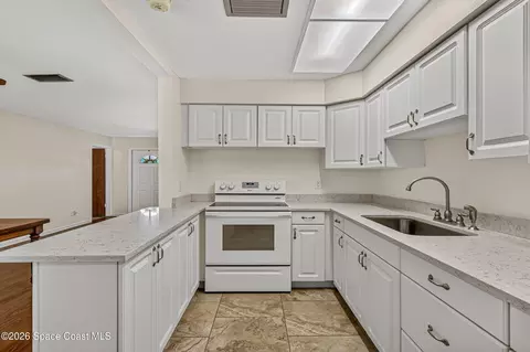 Kitchen - 830 Tupelo Dr, Melbourne, FL 32935 photo 2 of 3