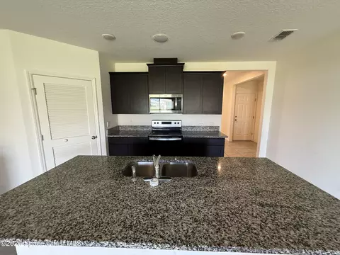 Kitchen - 1345 Valley View Ave, Rockledge, FL 32955 photo 2 of 3