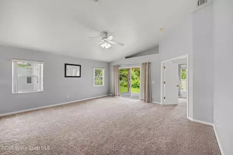Living - 2476 Hidden Pine Ln NE, Palm Bay, FL 32905 photo 2 of 3