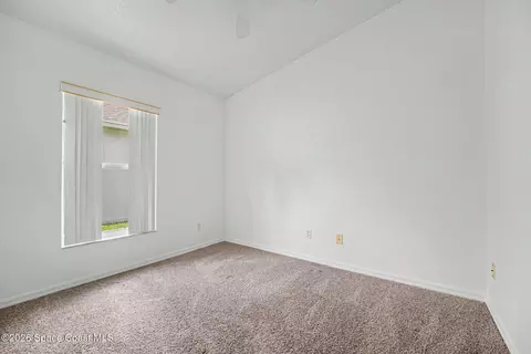 Bedroom - 2476 Hidden Pine Ln NE, Palm Bay, FL 32905 photo 3 of 4