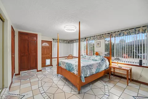 Bedroom - 459 Angelo Ln, Cocoa Beach, FL 32931 photo 1 of 7