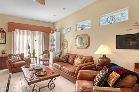 Living - 394 Carmel Dr, Melbourne, FL 32940 photo 1 of 3