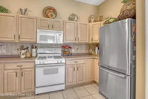 Kitchen - 394 Carmel Dr, Melbourne, FL 32940 photo 1 of 4